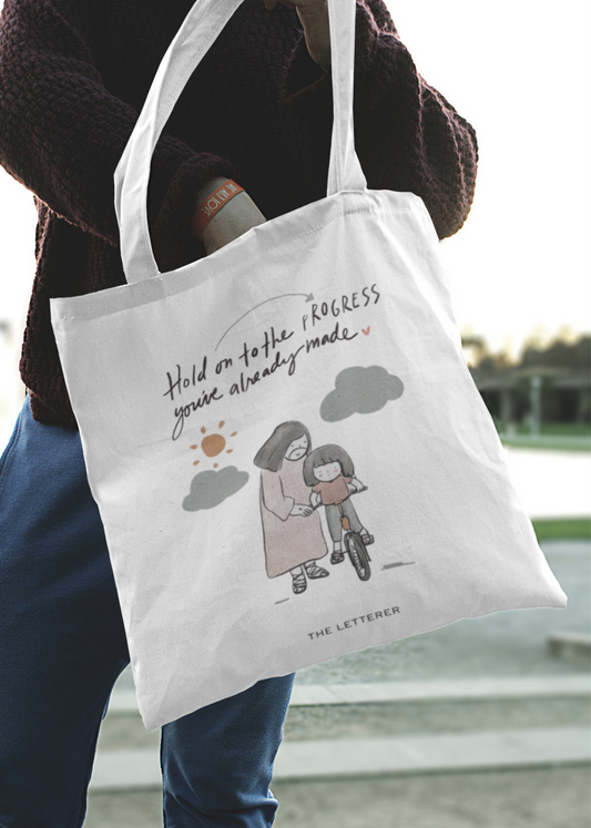 Hold on to the Progress Tote Bag